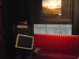 Man Contemplates Digital Display