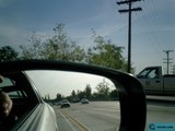 Reflection in the Car Mirror