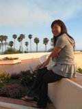 Woman enjoying the view at a wine tasting