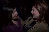 Two Women Sharing an Intimate Conversation at Night