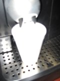 Coffee Pouring into Machine