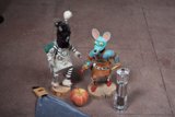Two Figurines Enjoying an Apple Treat