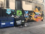 Urban Art Meets Trash Container