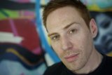Freckled Man in Black Shirt
