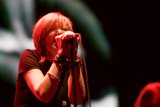 Redhead Enthralls Crowd with Spellbinding Performance