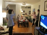 Friends Gather for Hanukkah Dinner Party at Home