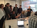 Group of Professionals Working on Laptops