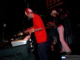 Red-Shirted Pianist Rocks the Nightclub