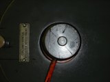 Red Handled Metal Object in a Car