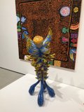 Vibrant Sculpture Adds Color to White Table