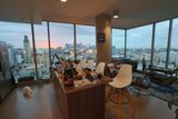 A Penthouse View of Urban Sunset
