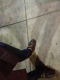 Brown Shoes on Tartan Floor