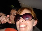 Two Friends Goofing Off in a Car at Night