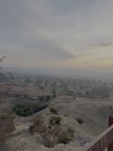 Misty Morning Valley with Rolling Hills