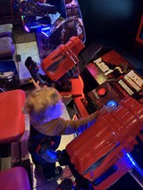 Young Gamer Playing Retro Arcade Game