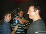 Trio of Men Enjoying a Drink in Urban Club