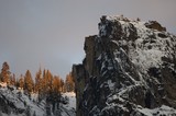 Snow-Dusted Rock Pinnacle at Winter Sunset