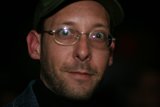 Man with Glasses and Hat