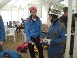 Group of Workers in a Tent at a Construction Site