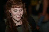 Red-headed Woman with a Contagious Smile