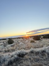 Desert Sunset Over Sagebrush Landscape in New Mexico