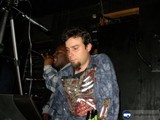 Metal-Skeleton Shirted Man Rockin' the Mic