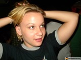 Blonde beauty in a T-shirt and earrings