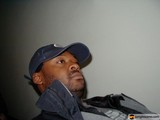 The Cap-Wearing Man