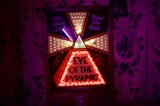 Eye of the Pyramid Carnival Game with Neon Lights