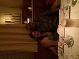 Couple Smiling Together at Romantic Restaurant Dinner