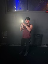 DJ Performer Captured Mid-Set at Electronic Music Venue