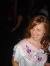 Young Woman Smiling at a Nightclub Party