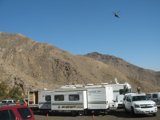 Aerial view of RV caravan with helicopter
