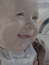 Joyful Baby's Bright Smile and Sparkling Eyes