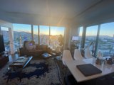 Cityscape View from Penthouse Living Room