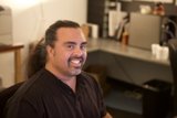 Long-Haired Man's Joyful Smile
