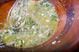 Herb-infused meal prep in a wooden bowl