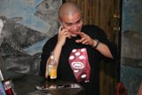 A man enjoying his drink
