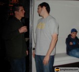 Grey Shirted Man in a Night Club