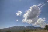 Majestic Cloud over Mountain Range