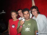 Three friends enjoy a drink together