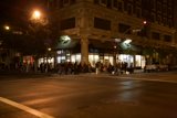 Nighttime Metropolis Crowds Swarm City Intersection