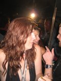 Red Haired Woman in Urban Night Club