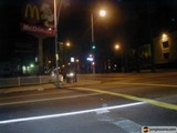 Glowing McDonald's Sign in the City at Night