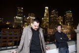 Two Men Enjoying the City Lights