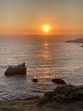 Serene Sunset by the Rocks
