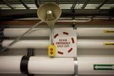Warning Bell on Pipe Sign