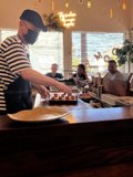 Restaurant Chef Prepares Dinner for Guests