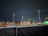 Industrial Night Scene with Power Lines and Graffiti