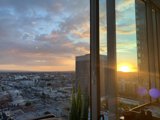 Urban Sunset from High-Rise Office Building